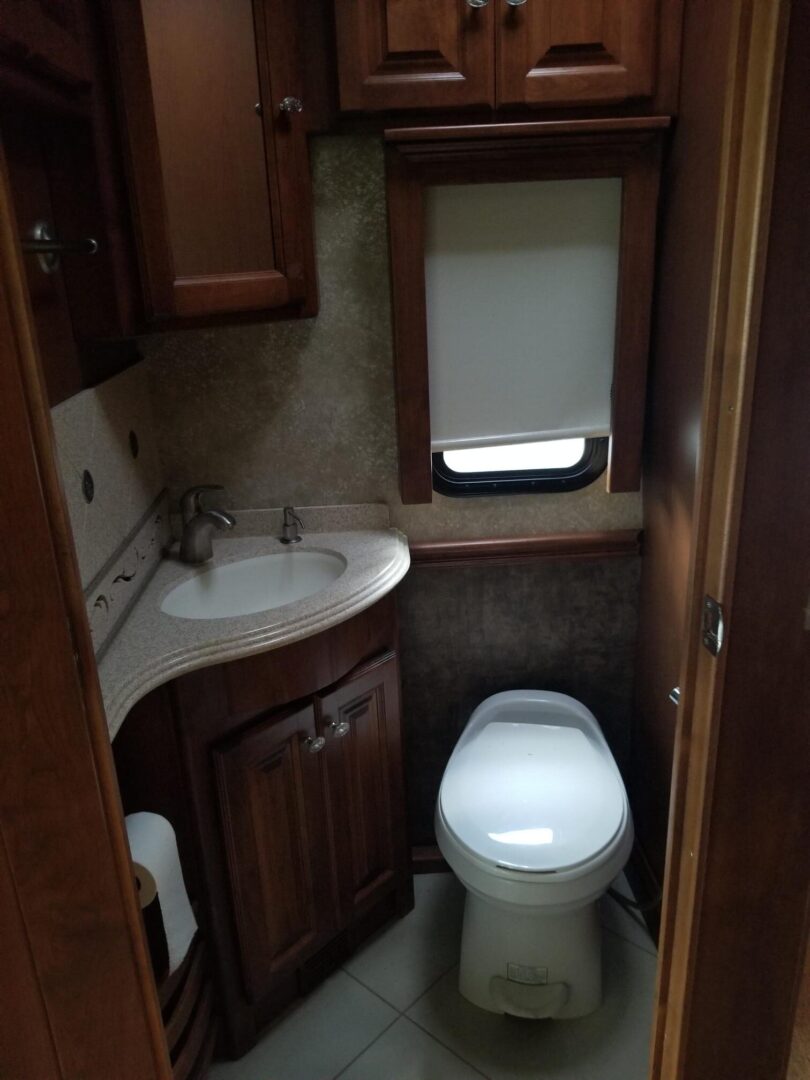 A small bathroom with a toilet and sink.