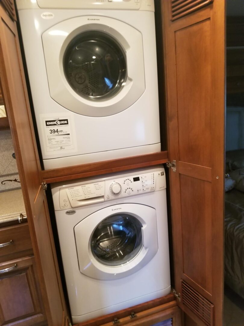 A washer and dryer in a cabinet in an rv.