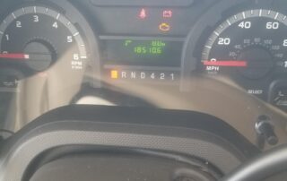The dashboard of a car with gauges and gauges.