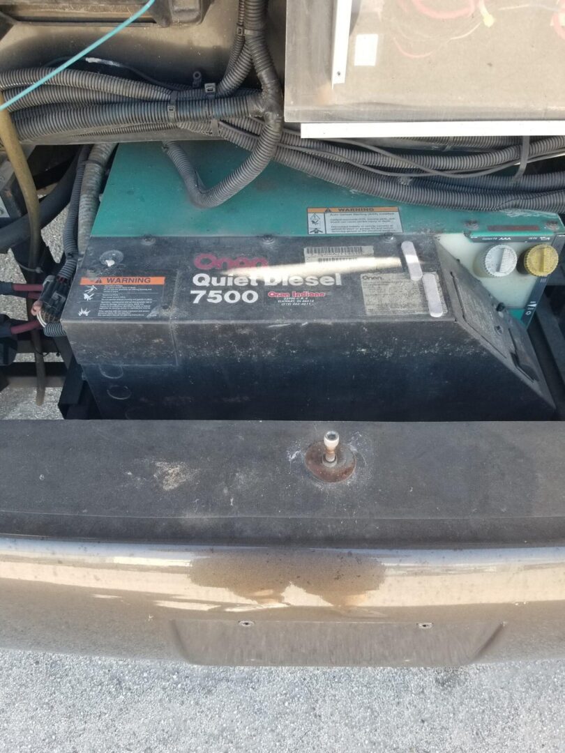 A car battery in the trunk of a car.