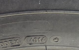 Close up of a tire with the number 4014.