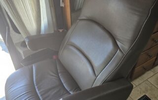 Brown leather seat in a camper van.