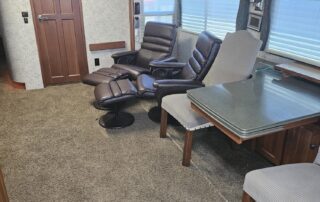 RV living room with leather recliners.